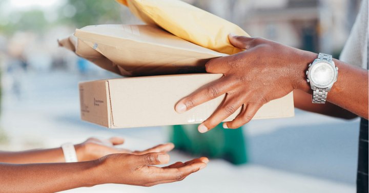 Person Handing Over Packages