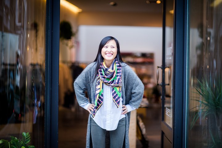 Woman with colourful scarf smiling
